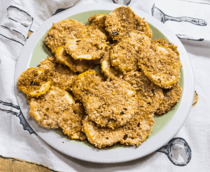 breaded yellow squash on a plate