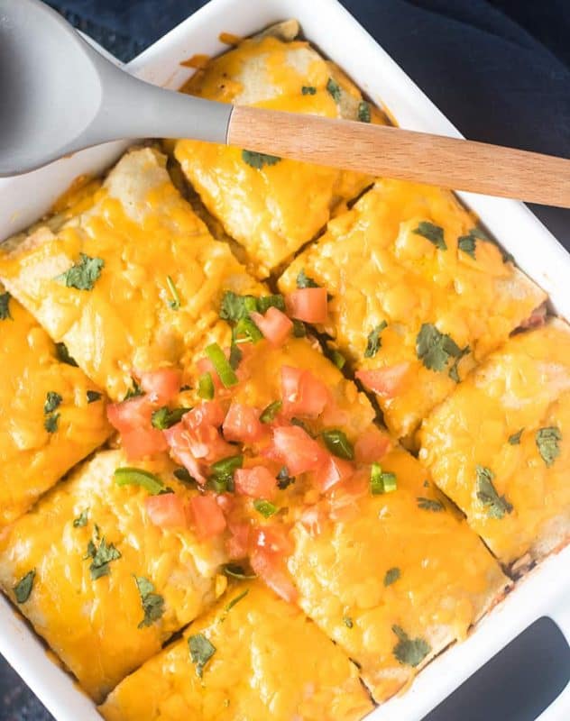 Taco Casserole garnished with chopped tomatoes, jalapeno, & cilantro.