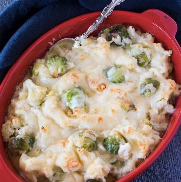 Cauliflower & Brussels Sprouts combined in a cheesy au gratin in a casserole dish.