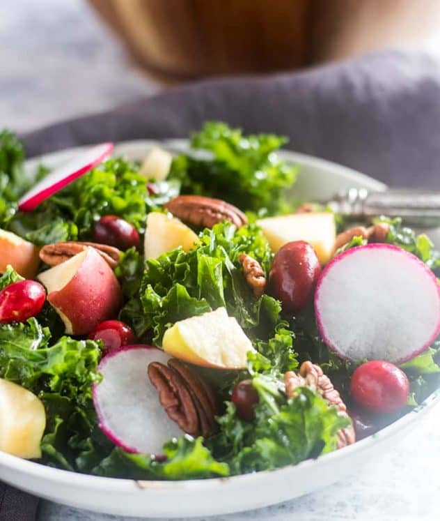 Apple Kale Cranberry Salad in a bowl.