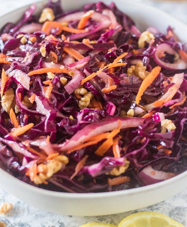 Red Cabbage Salad in a white bowl.