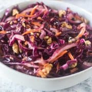 Red Cabbage Salad in white bowl.