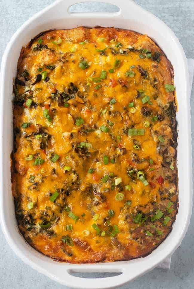 Tater Tot Breakfast Casserole in white casserole pan.