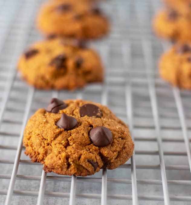 Pumpkin Chocolate Chip Cookies on a cooling wrack.
