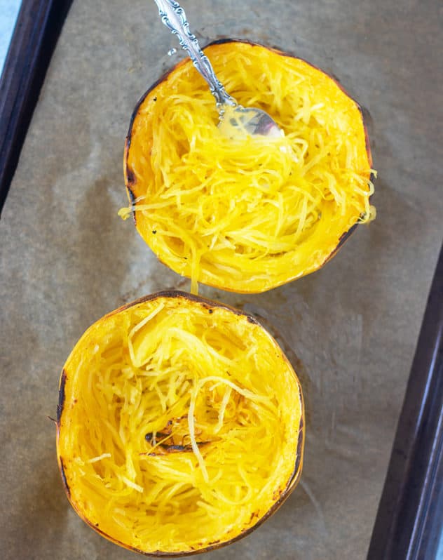Spaghetti Squash Cut in half and after it's been cooked removing the strands with a fork.
