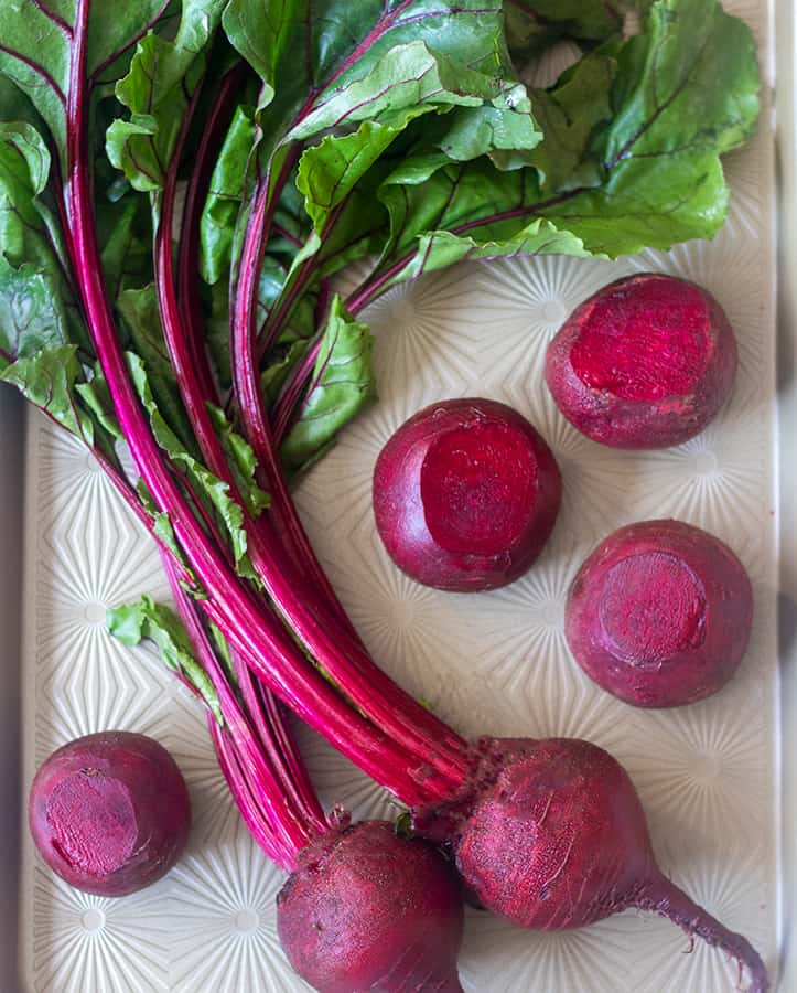 Fresh Beets on the stalks and some that have been trimmed