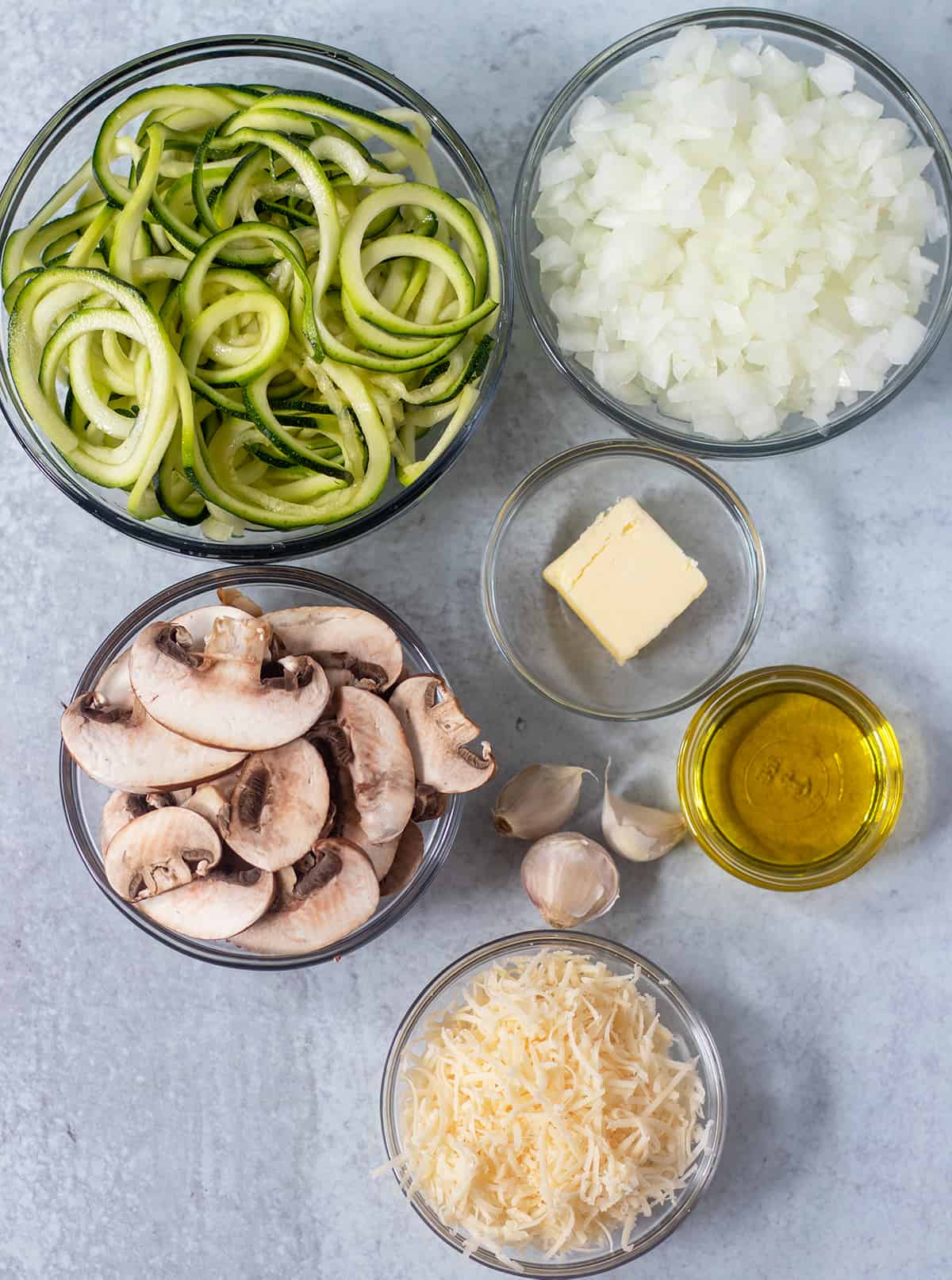 zucchini noodles, onions, mushrooms, garlic, butter, olive oil, parmesan cheese