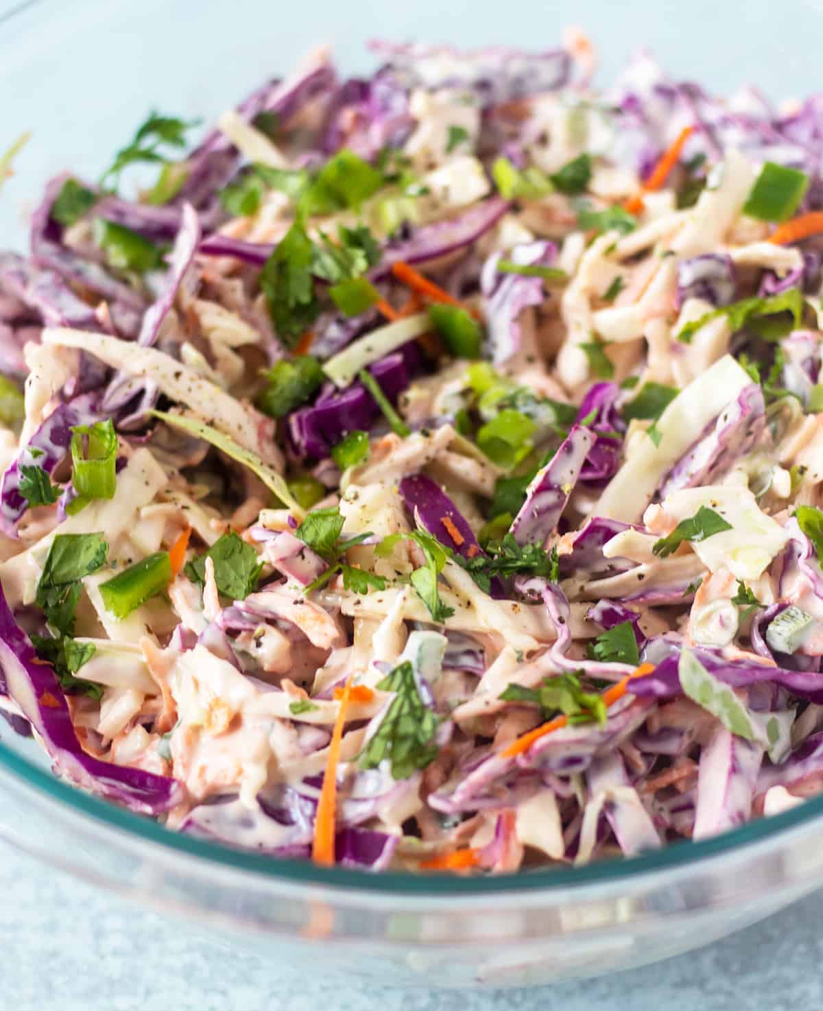 Cilantro Lime Slaw in a clear serving bowl