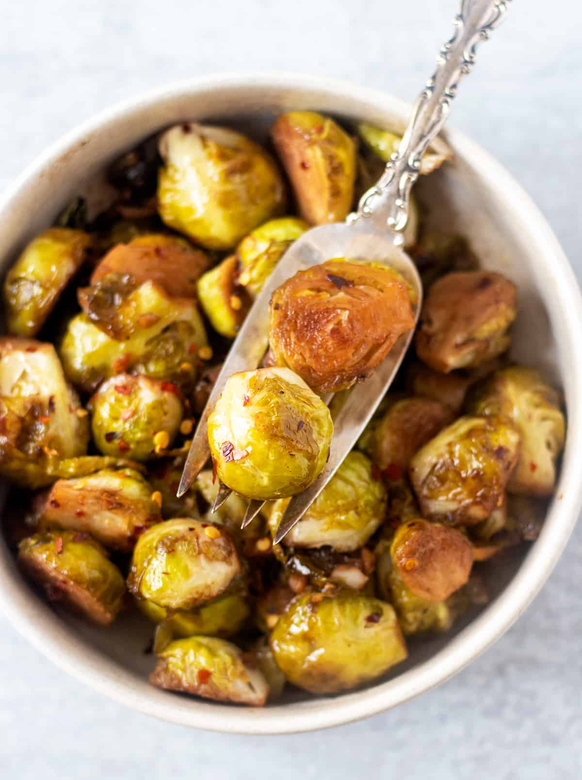 brussel sprouts on a silver serving fork