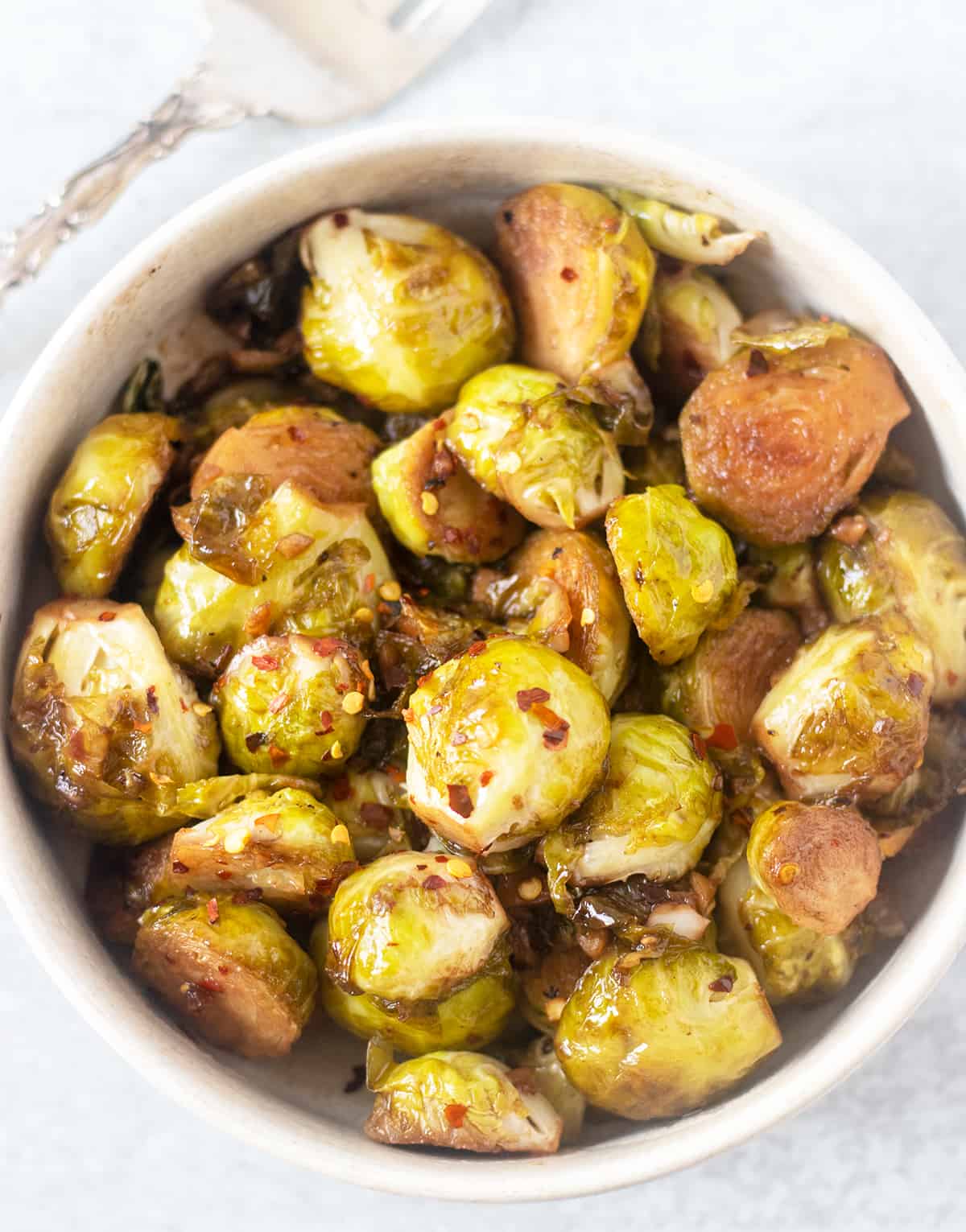 sprouts in a white serving bowl
