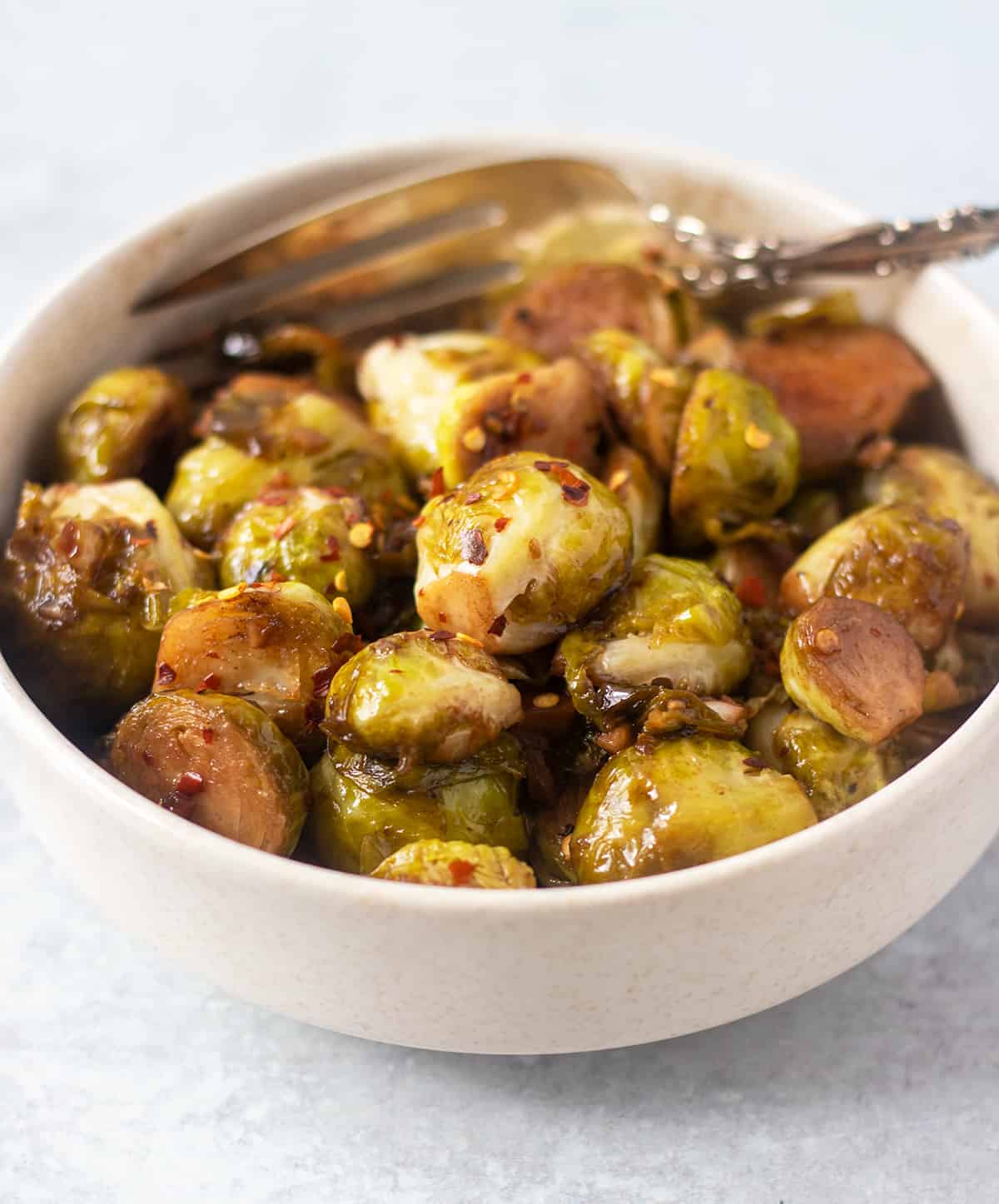 balsamic brussel sprouts in white bowl