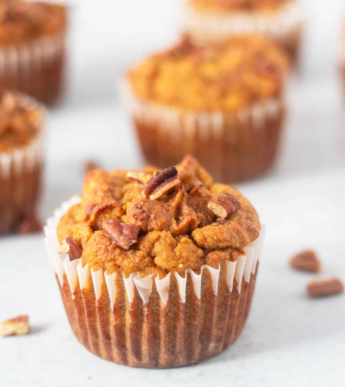 pumpkin muffins in baking liners after being cooked