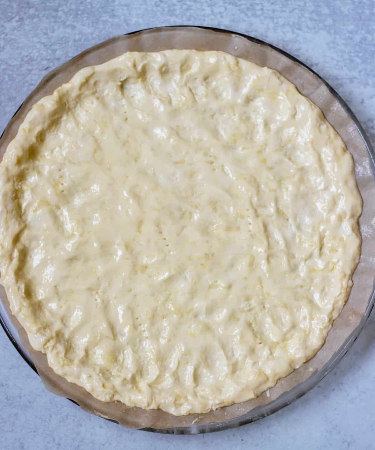 gluten free pizza crust prior to being baked