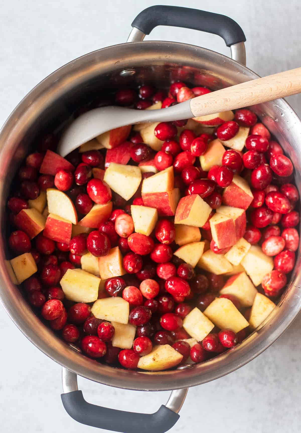 cranberries, and chopped apples in a large soup pot.