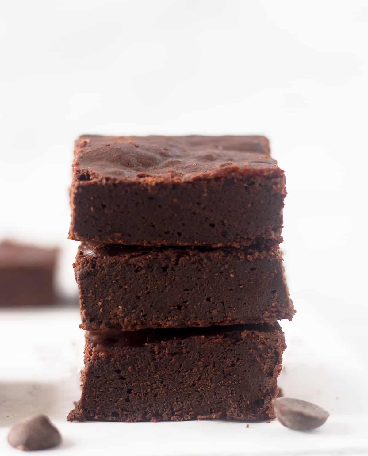 Three Flourless Brownies stacked on top of each other