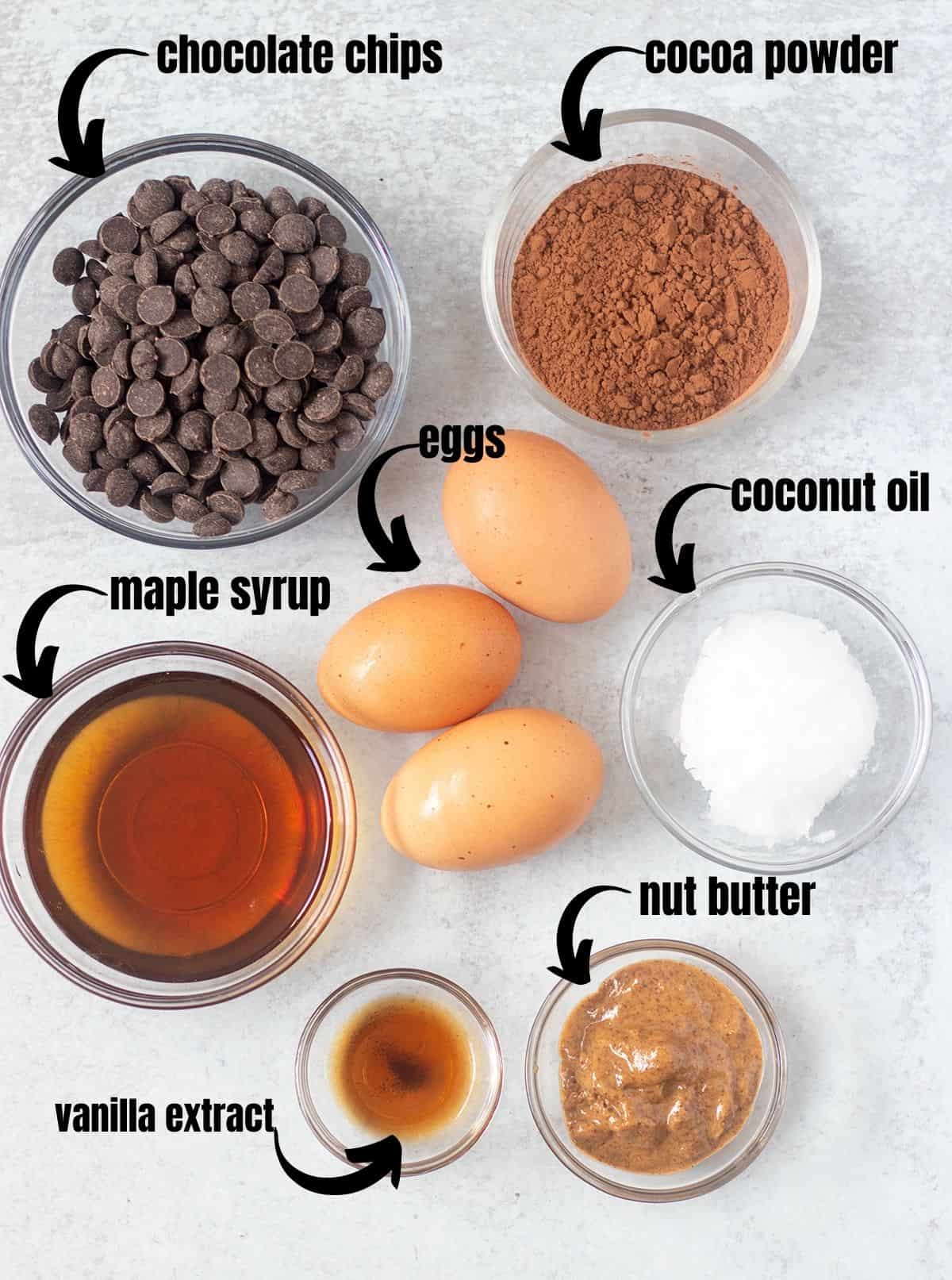 chocolate chips, cocoa powder, maple syrup, eggs, coconut oil, nut butter, vanilla extract