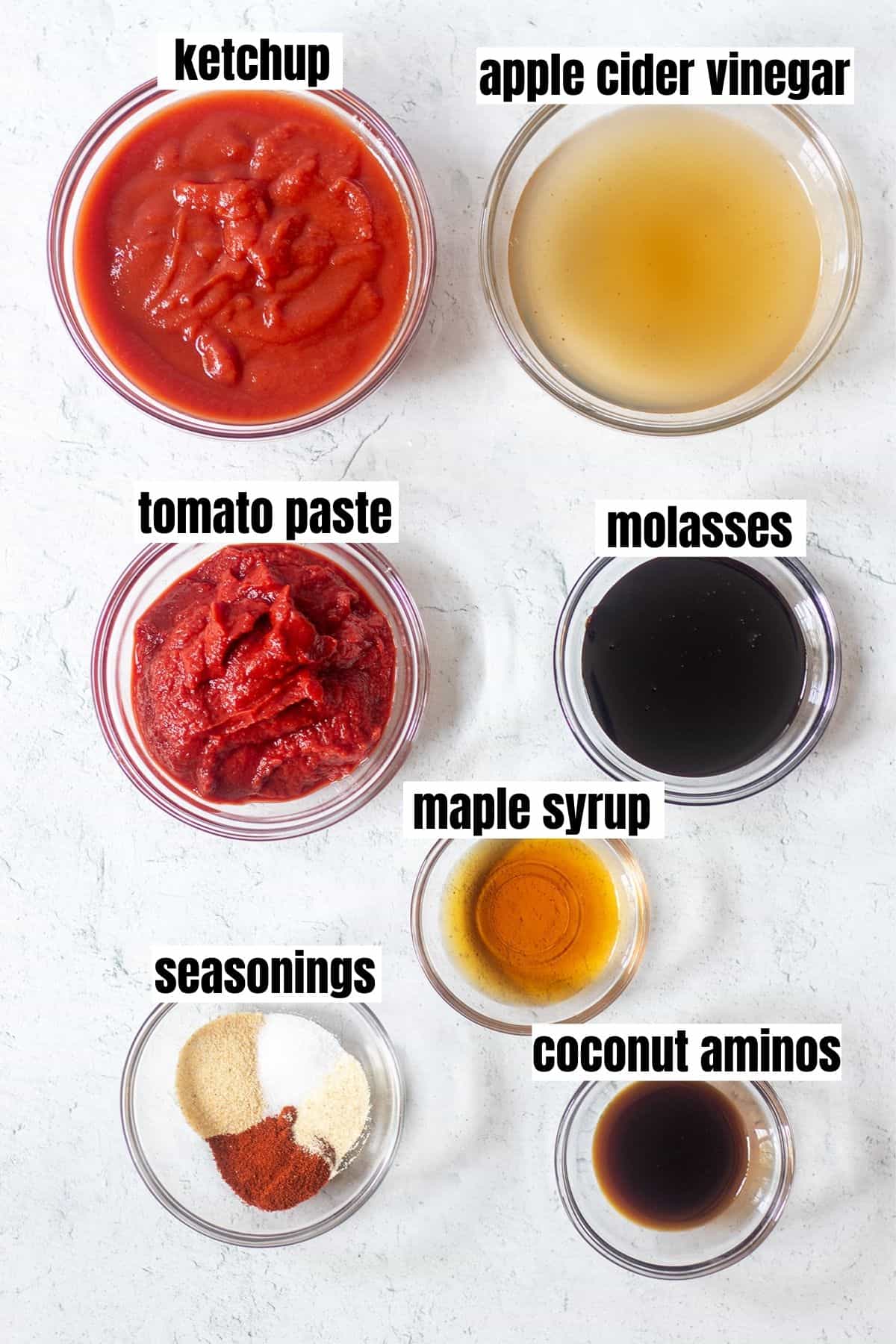 ketchup, apple cider vinegar, tomato paste, molasses, maple syrup, coconut aminos, seasonings.