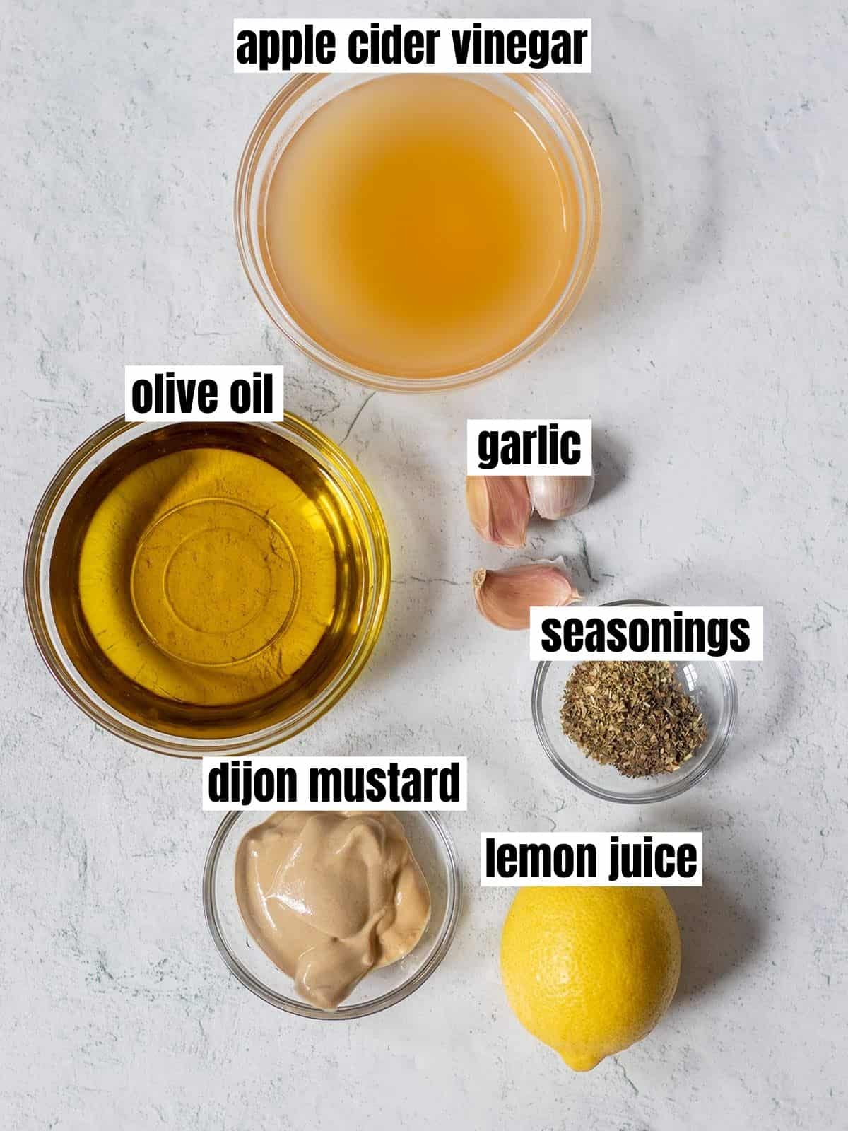 apple cider vinegar, olive oil, garlic, dijon mustard, seasonings, lemon juice