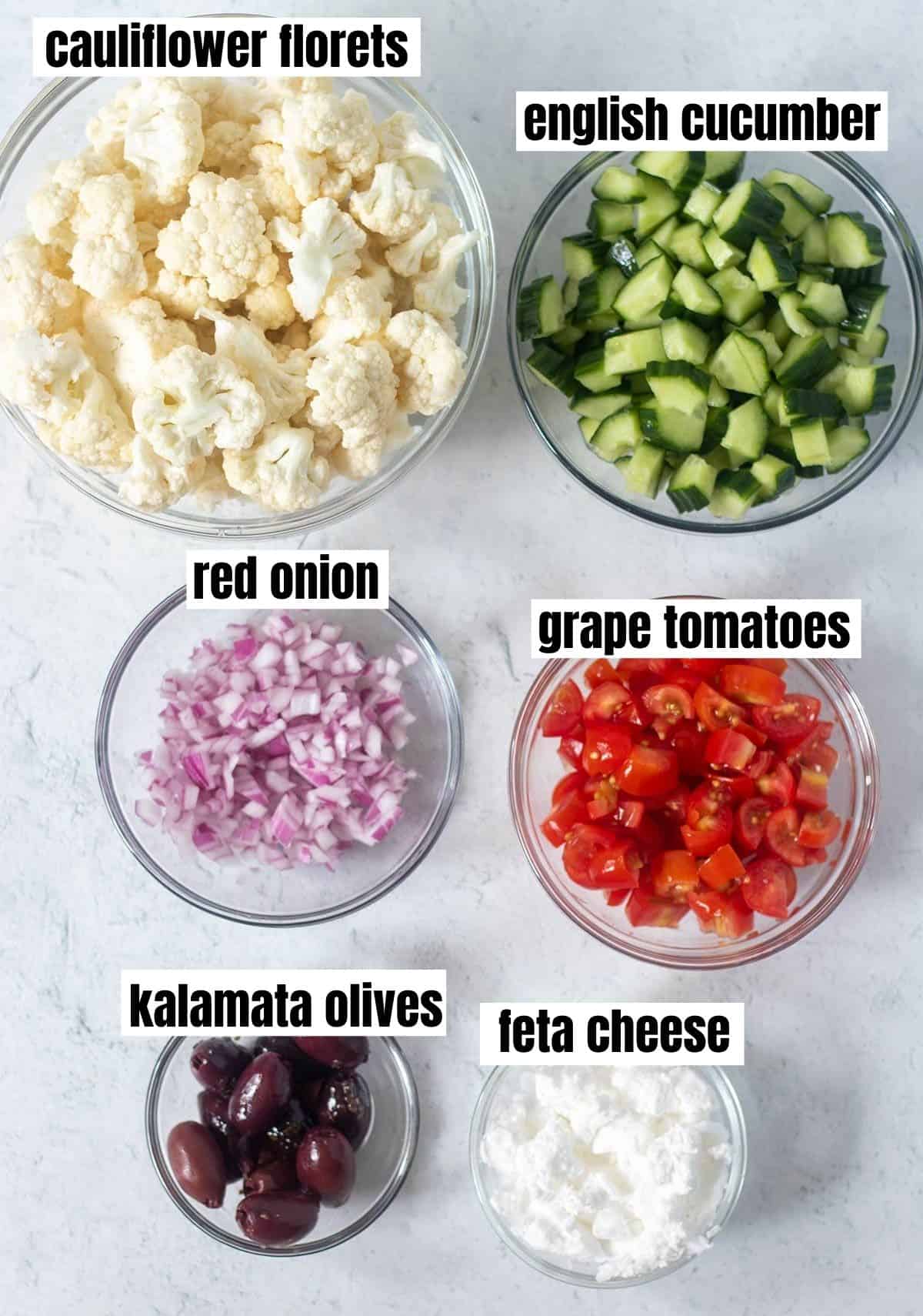 cauliflower florets, english cucumber, red onion, grape tomatoes, kalamata olives, feta cheese