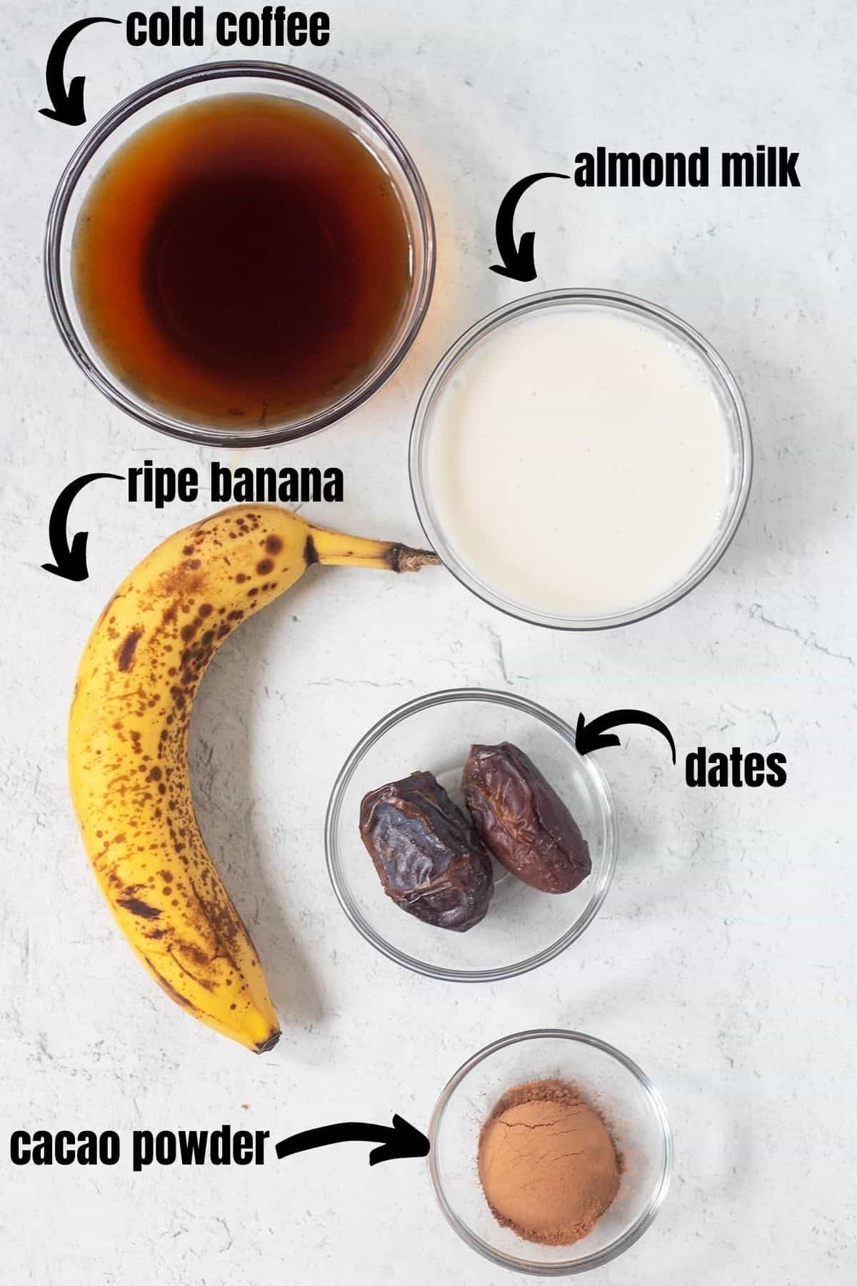 cold coffee, almond milk, ripe banana, dates, cacao powder