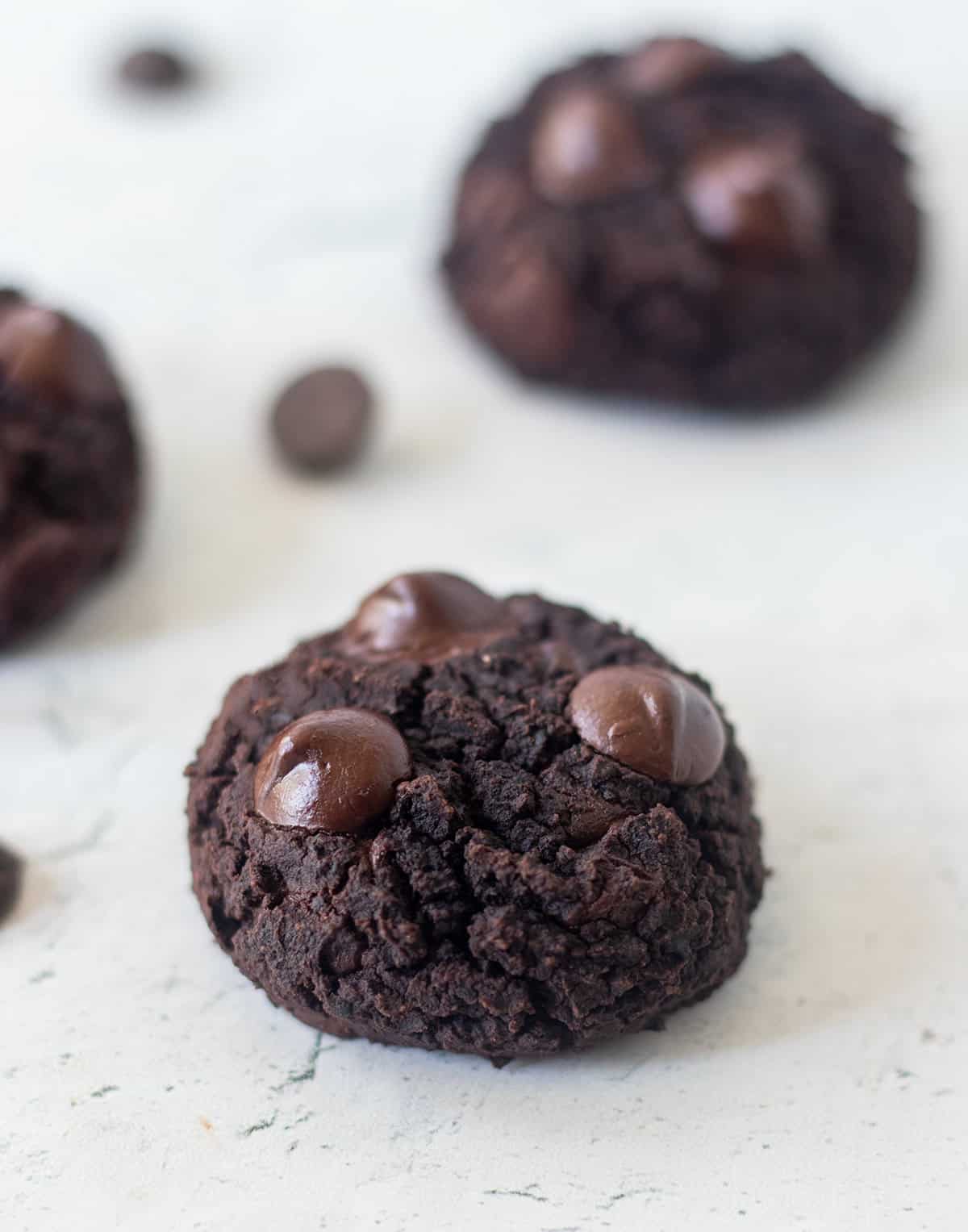 black bean cookies topped with extra chocolate chips.