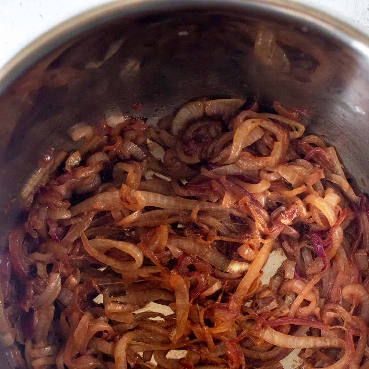 Onions after being caramelized in the pot.