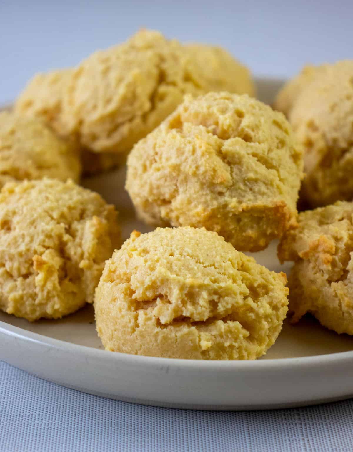 almond flour biscuits on a beige plate.