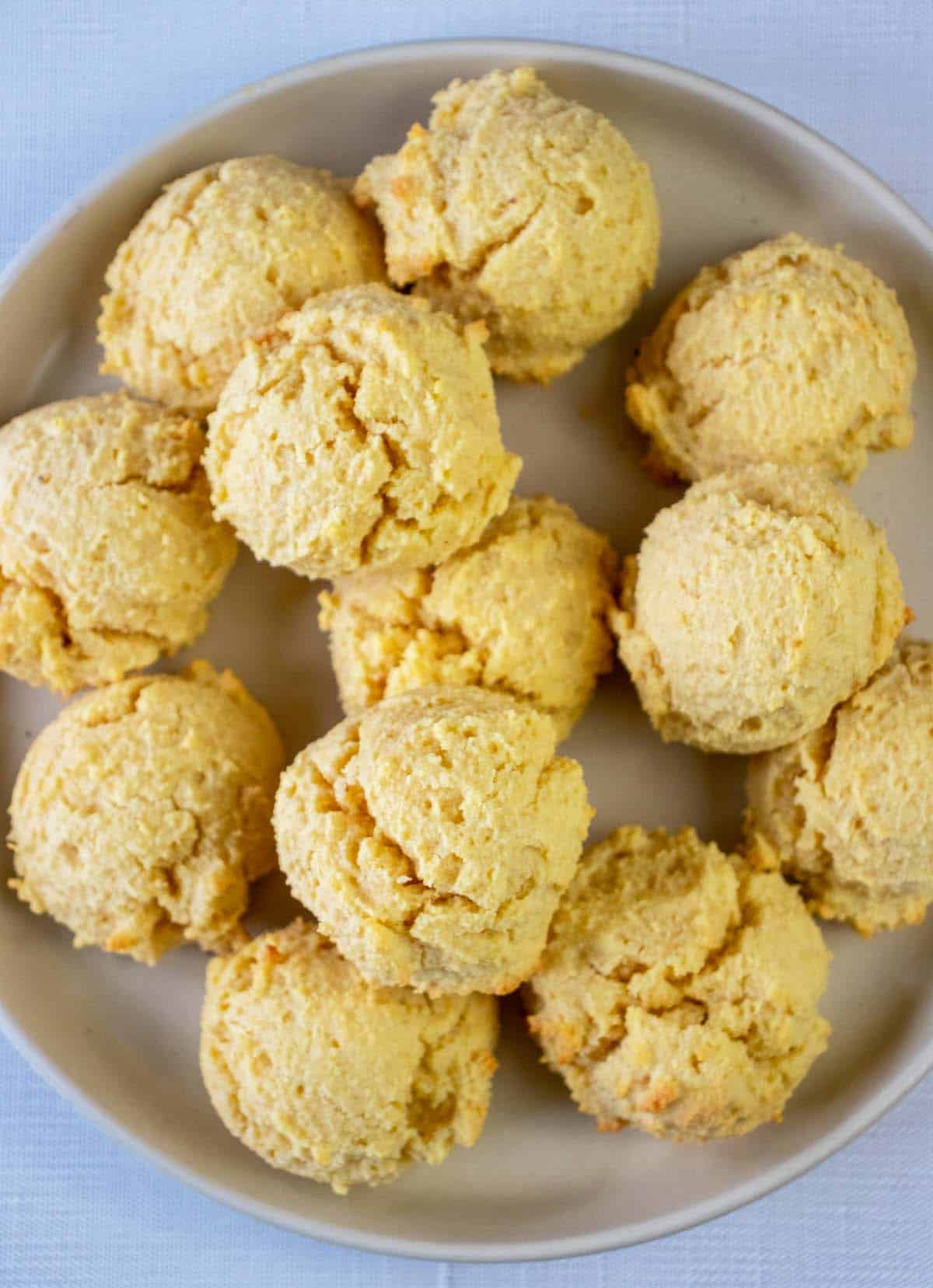 almond flour biscuits on a beige plate.